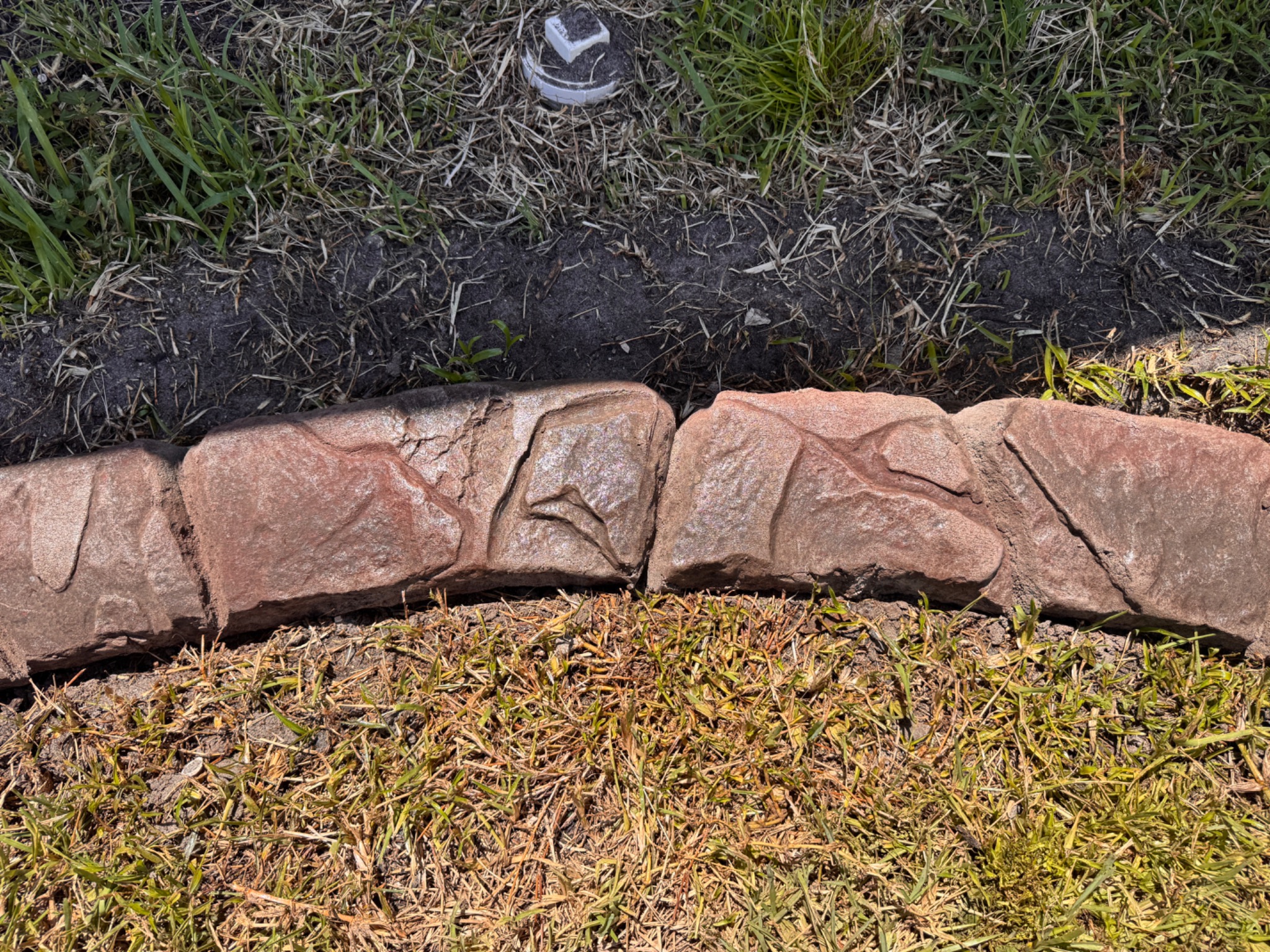 Hand-textured curbing detail